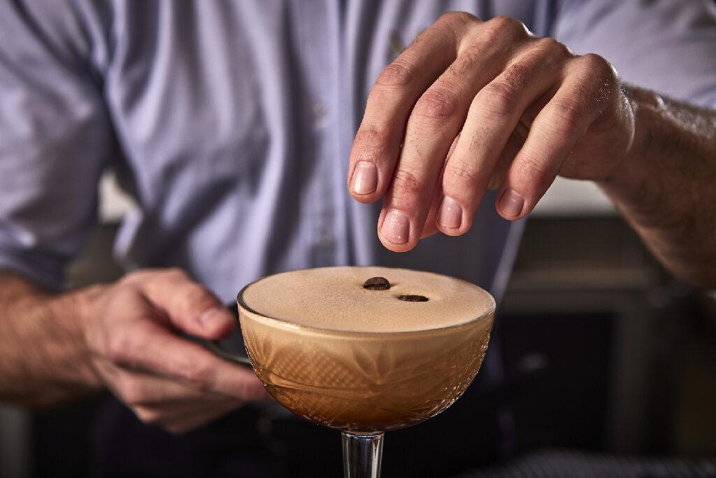 Hotel Cort Palma de Mallorca Exterior foto A bartender preparing a cappuccino